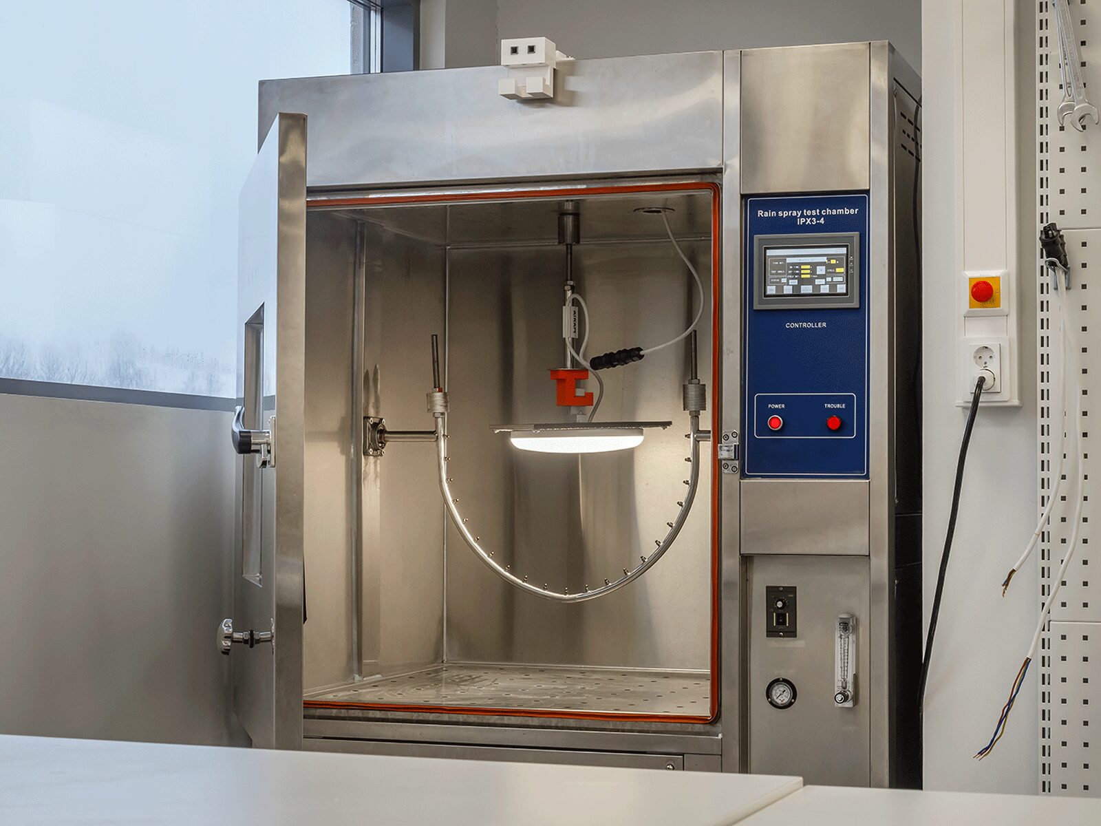 Airam tests new products at the testing laboratory at its Kerava facilities - IP rating test device.